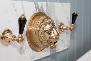 Chadder Royal Lions Head Bath filler, polished brass finish with Black Crystal tap leavers.